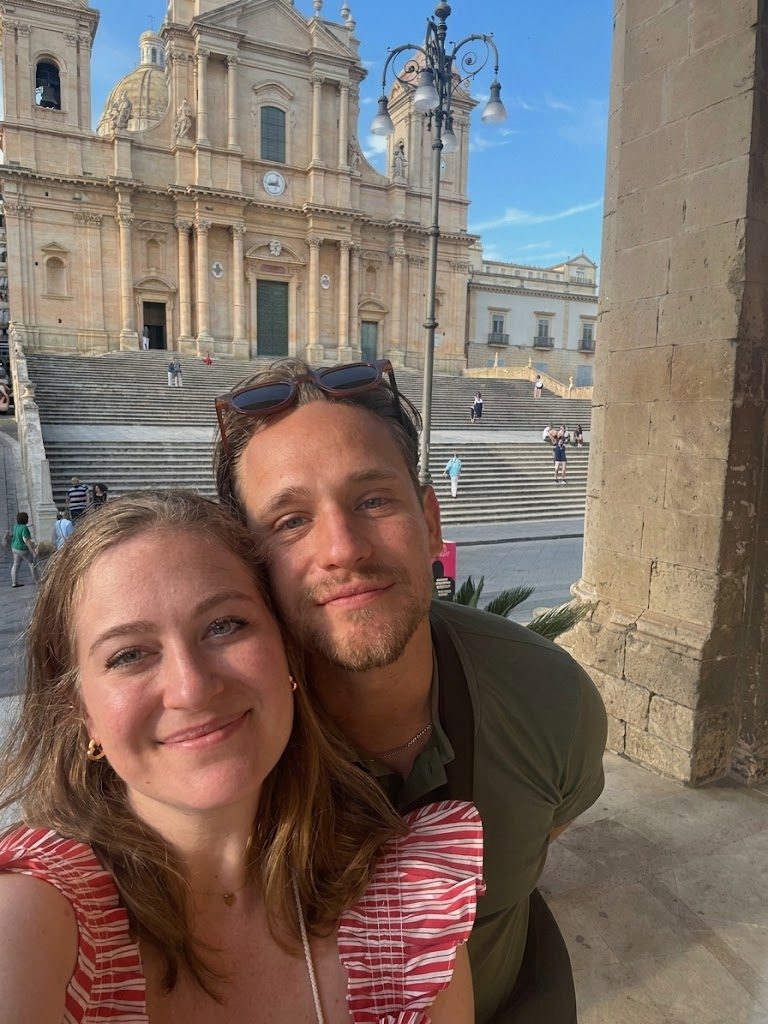Shelby and Andy in front of the cathedral steps in Noto, Sicily